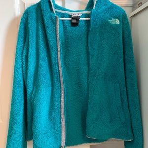 Blue/ greenish jacket with pockets and a hood